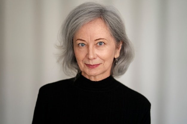 front-view-wise-woman-posing-studio_23-2149883511