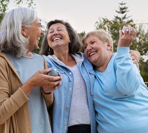 elderly-friends-playing-petanque_23-2149443876